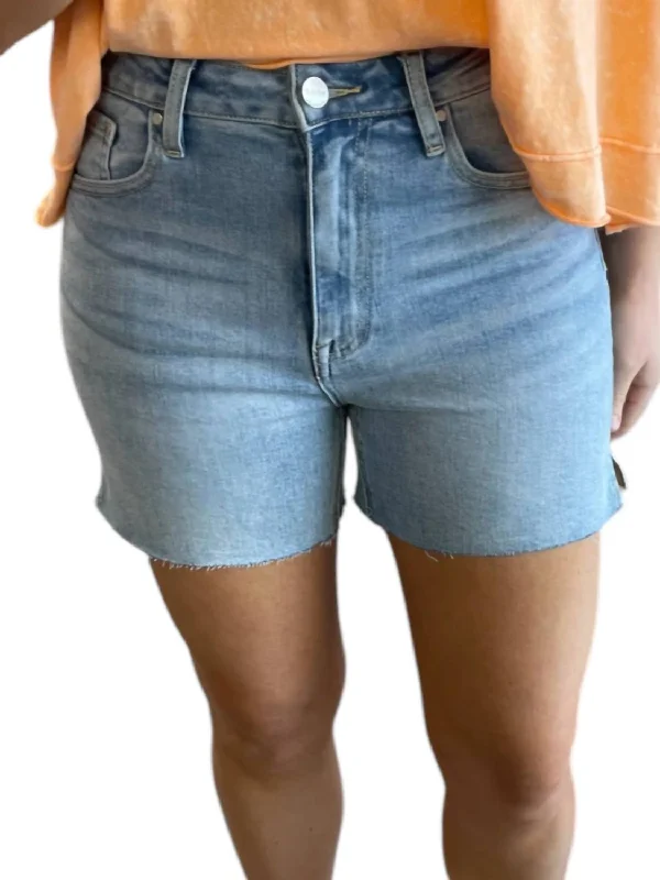 High Rise Raw Cut Denim Shorts In Light Wash